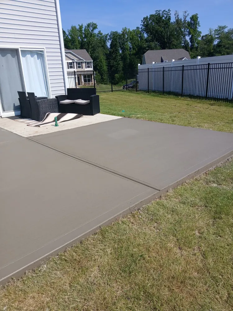 Backyard concrete patio with furniture, Yadkin County NC