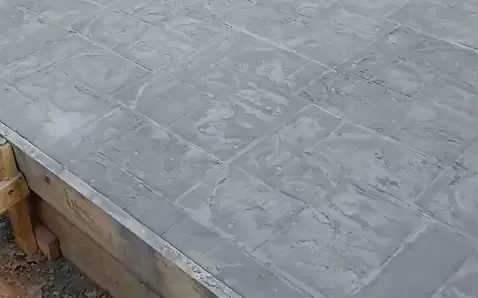 Freshly stamped concrete patio with tile pattern, Yadkin County NC